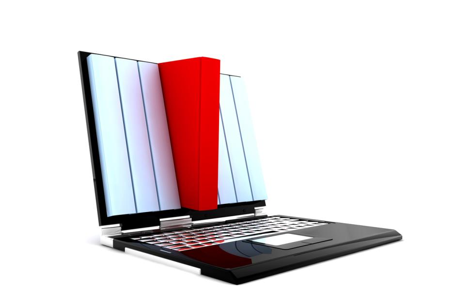 Laptop mit Büchern als Bildschirm